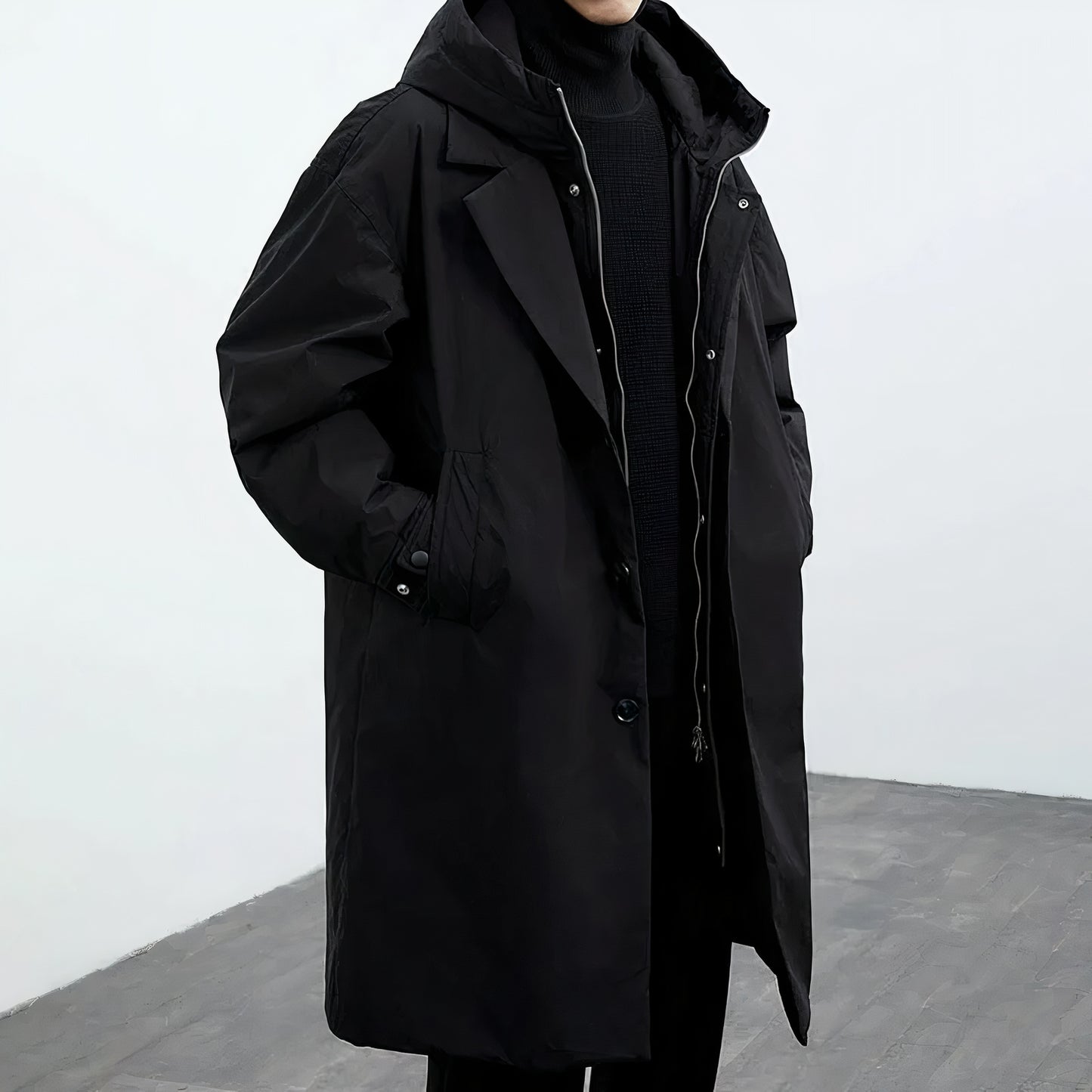 Casual winter trenchcoat voor heren met capuchon, weerbestendig en ideaal voor herfst- en winterdagen.