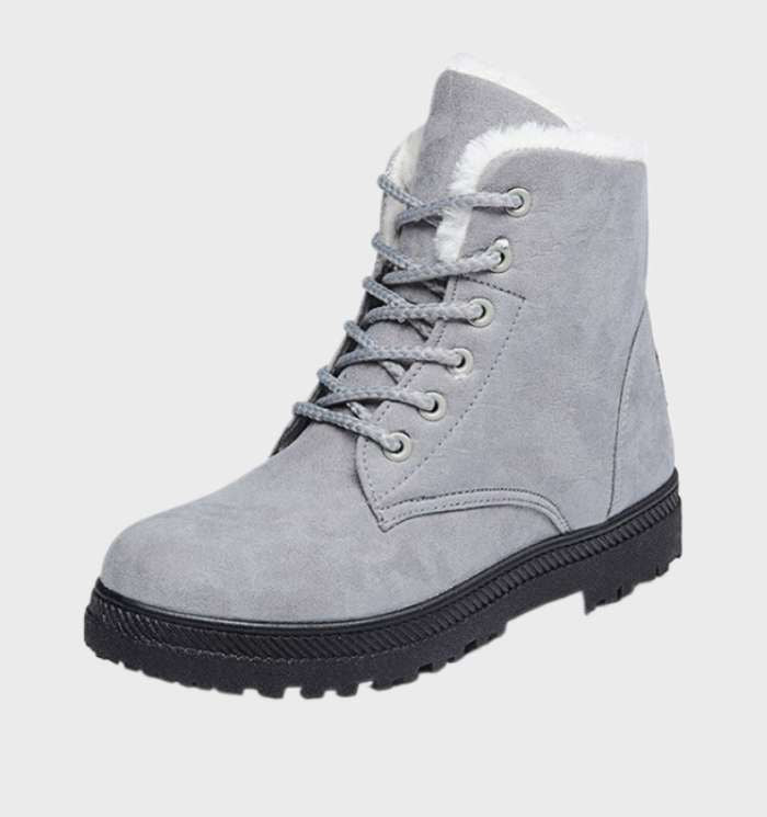 Dikke en warme waterdichte winterlaarzen voor dames, ideaal voor koude herfst- of winterdagen.