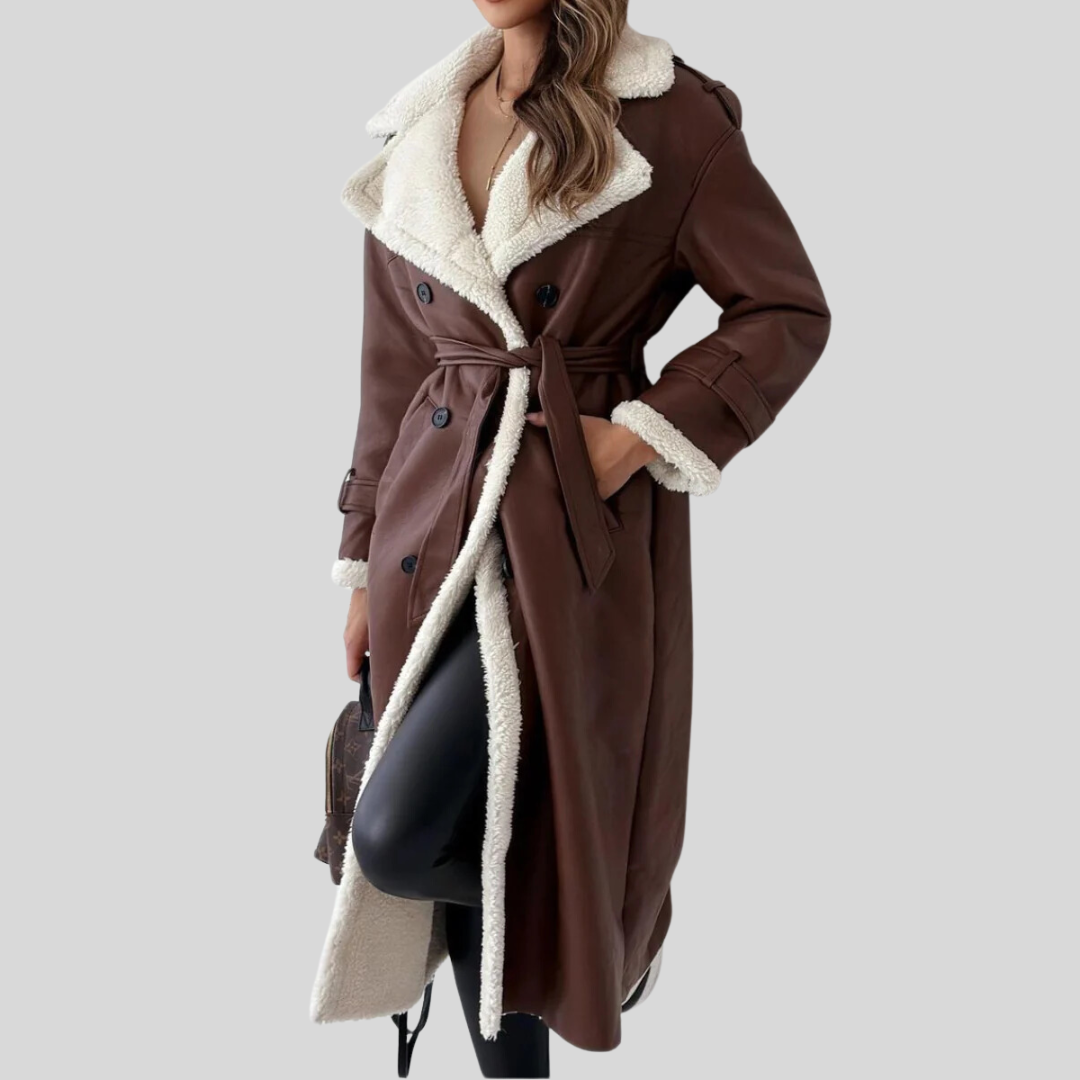 Luxueuze leren trenchcoat voor dames, met een elegant ontwerp en aansluitende pasvorm.