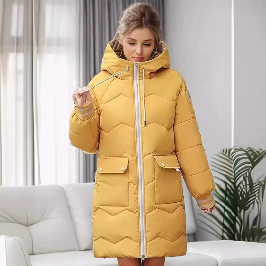 Lange warme winterjas met capuchon voor vrouwen, ontworpen voor stijl, comfort en bescherming tegen kou