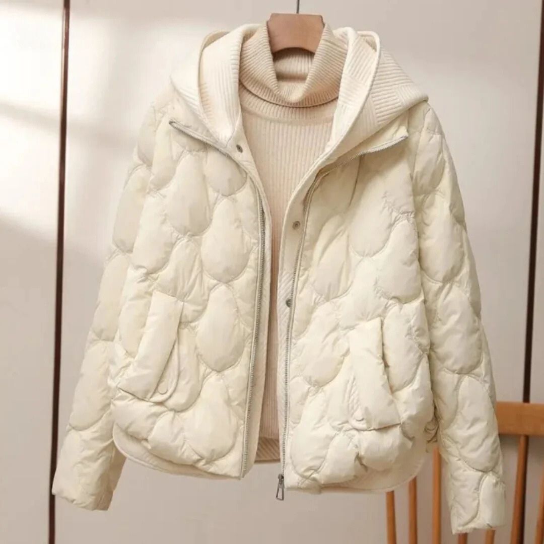 Stijlvolle damespufferjas met capuchon, ideaal voor herfst- en winterdagen