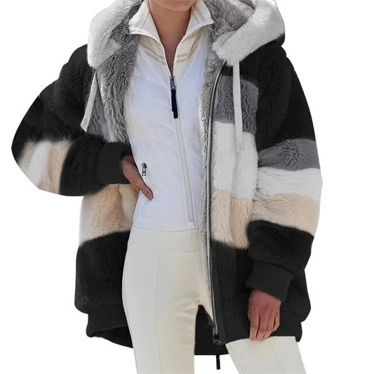 Stijlvolle dames teddyjas met zachte voering en trendy design, ideaal voor winterse dagen.