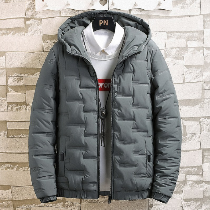 Gewatteerde winterjas voor heren in een casual ontwerp met een afneembare capuchon en moderne details.