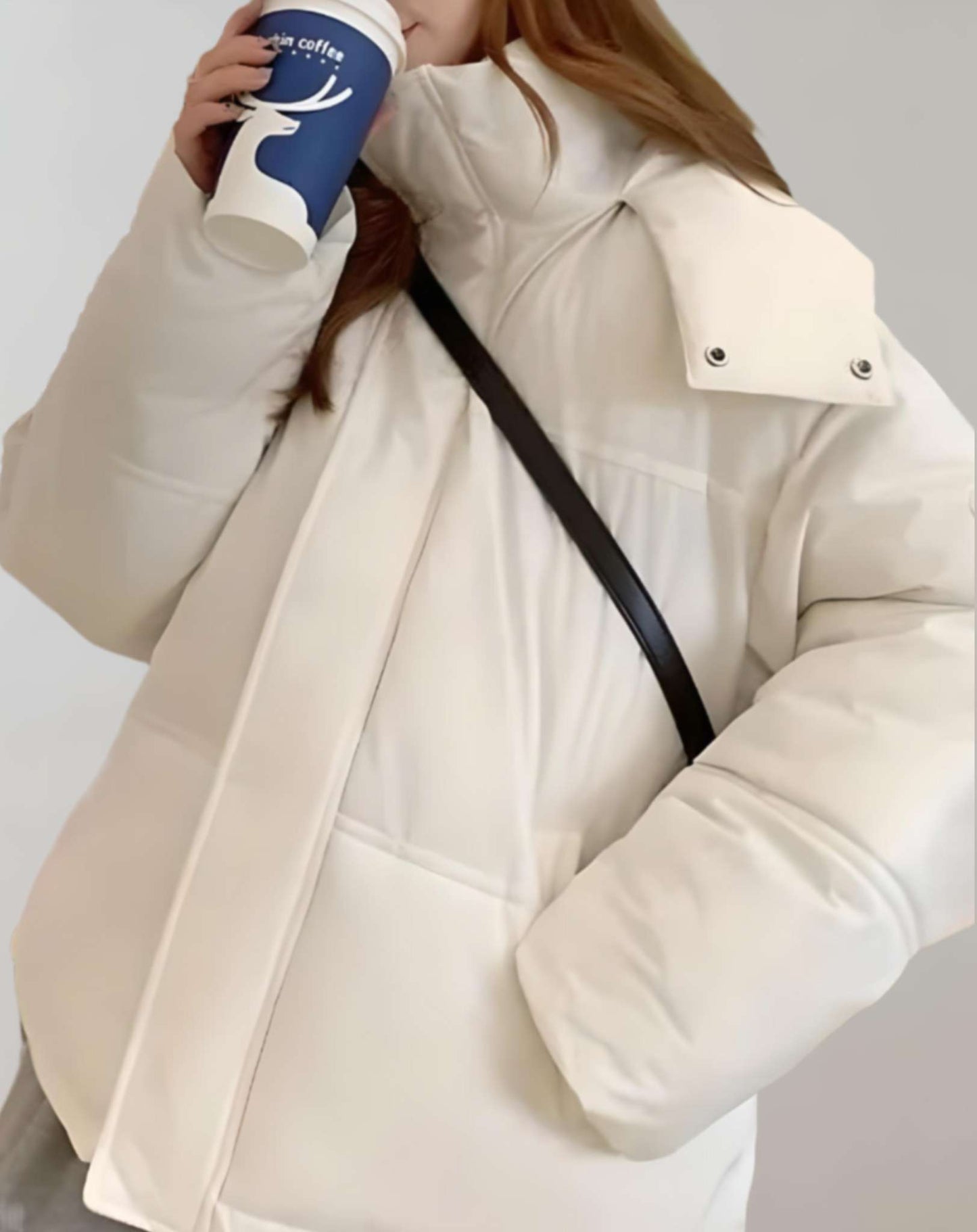 Warme, winddichte donsjas voor dames, ideaal voor koude herfst- en winterdagen.