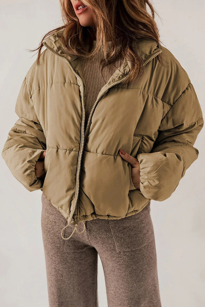 Warm gewatteerd winterjas voor dames met winddicht materiaal en praktische zakken, ideaal voor koude dagen