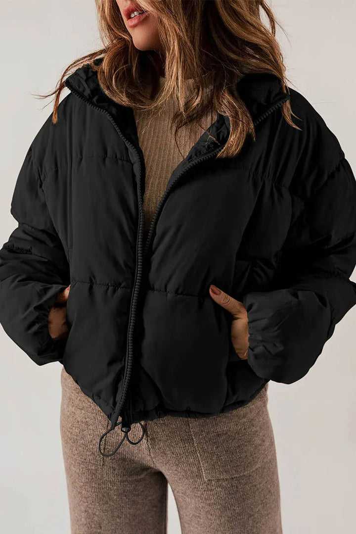 Warm gewatteerd winterjas voor dames met winddicht materiaal en praktische zakken, ideaal voor koude dagen