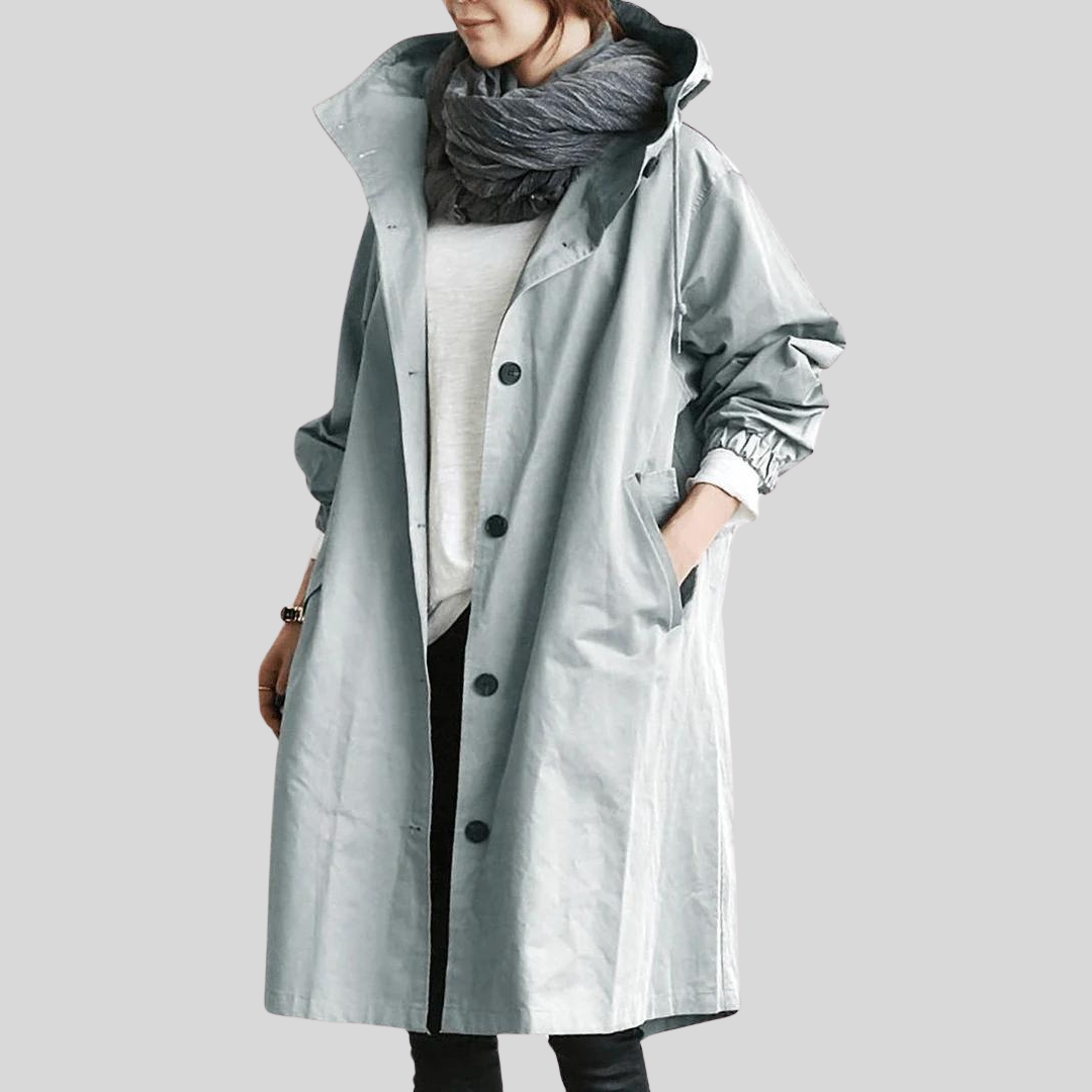 Waterdichte jas met capuchon voor dames, ideaal voor regenachtige dagen.