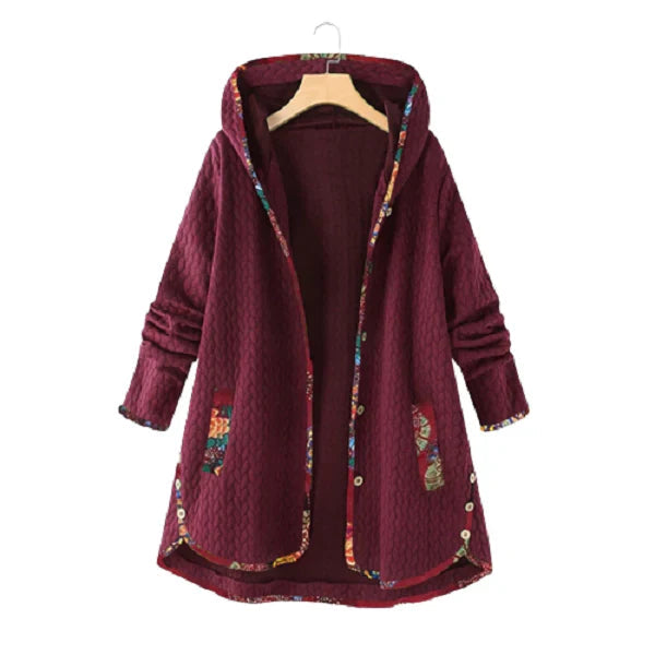 Winterjas met capuchon voor dames die betrouwbare bescherming tegen de kou en een modieuze stijl biedt.