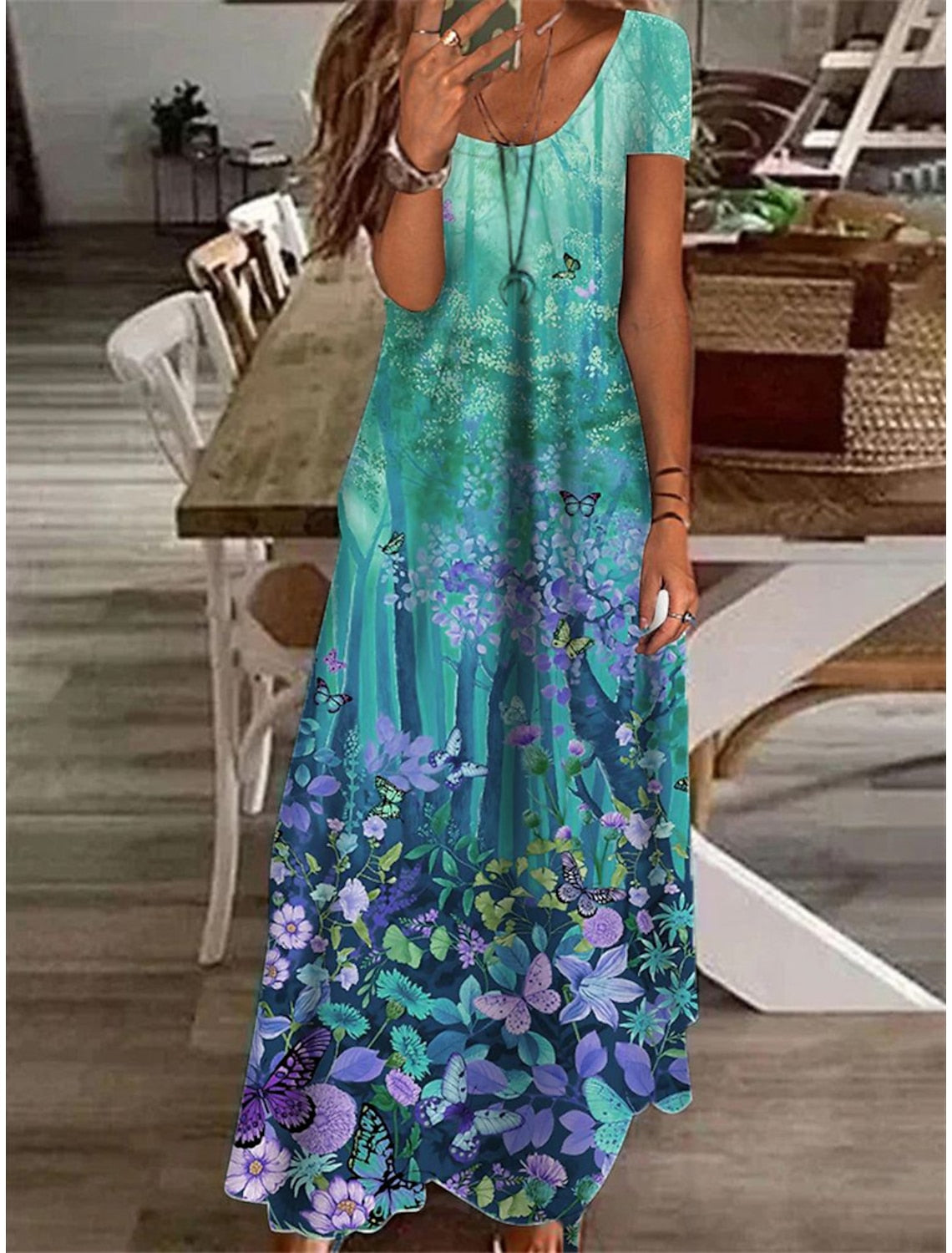 Luchtige, elegante maxi-jurk met bloemenpatroon voor warme zomerdagen