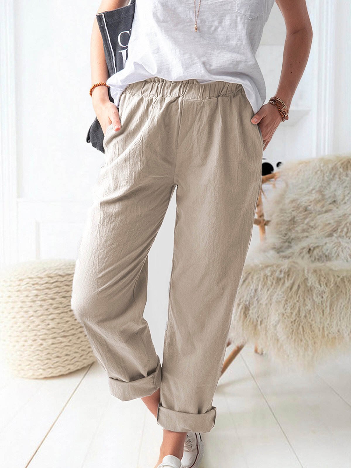 Luchtige linnen broek voor dames met een relaxte pasvorm, ademend en comfortabel voor warme dagen.