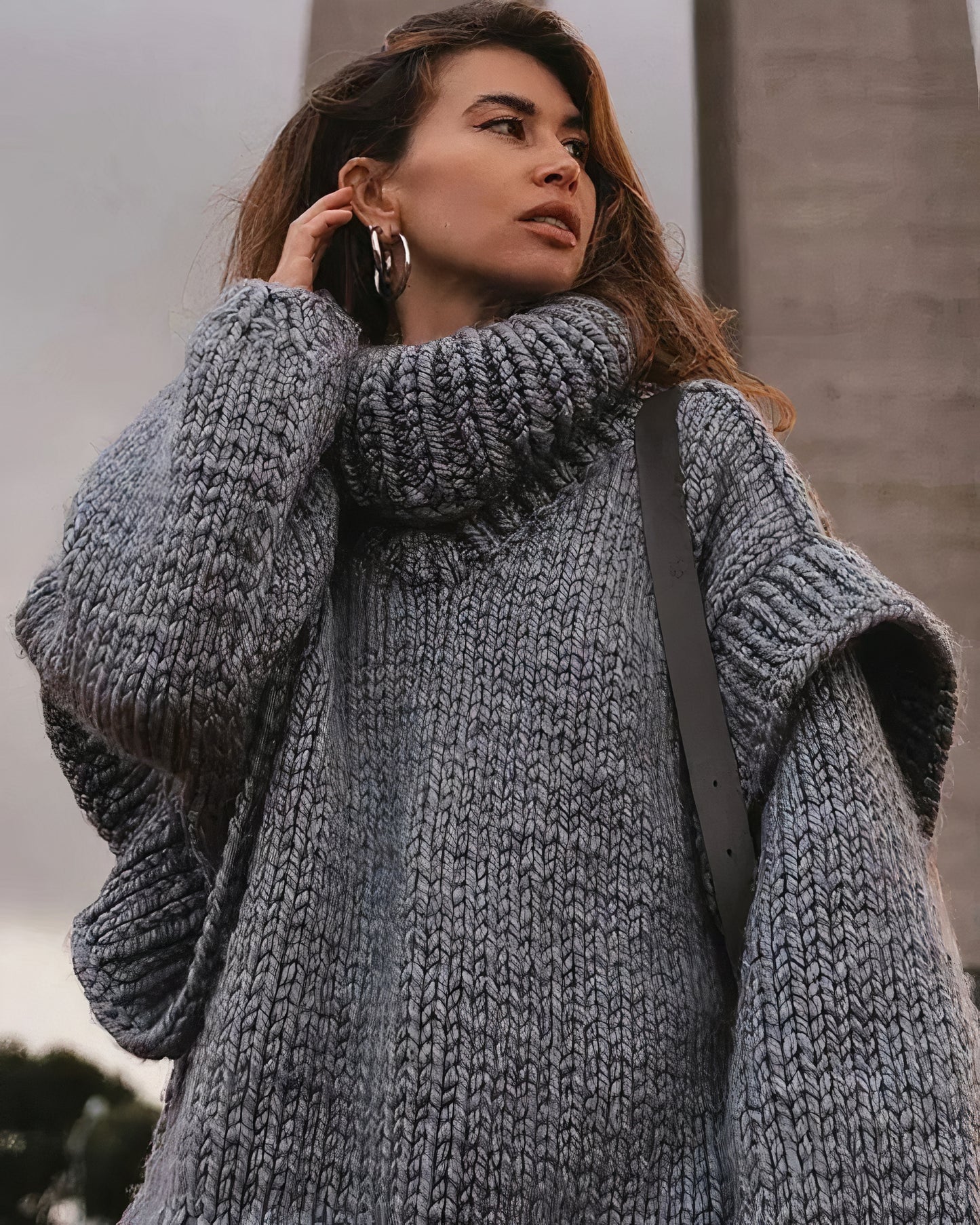Modieuze gebreide jumperjurk voor dames, ideaal voor elegante herfst- en winterdagen.