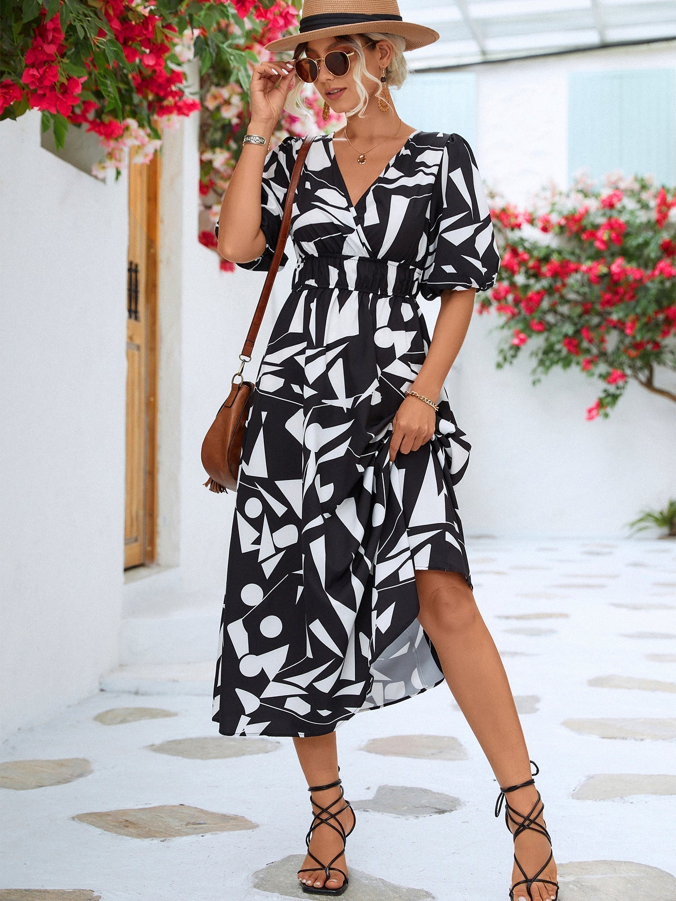 Stijlvolle midi-zomerjurk voor dames met luchtig comfort en een elegante snit.