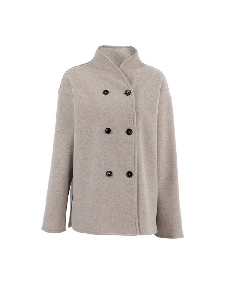 Warme jas voor dames met een Franse twist, ideaal voor herfst- en winterdagen, met een elegant double-breasted ontwerp en warm materiaal.