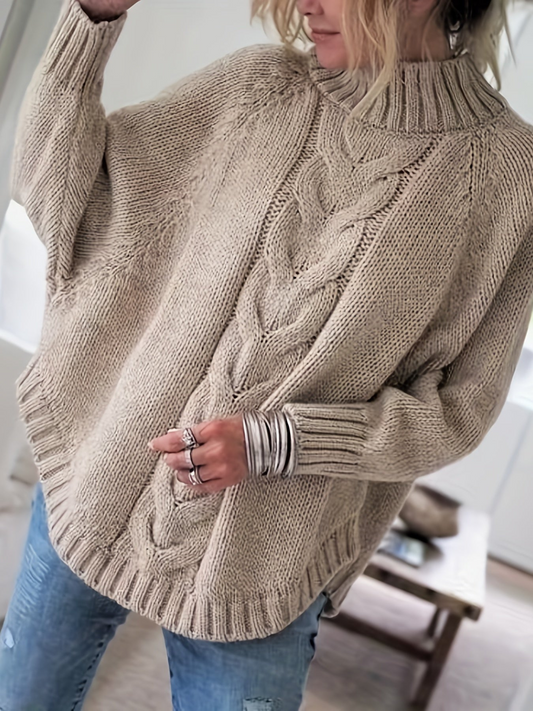 Warme gebreide trui voor dames met een elegant kabelpatroon, ideaal voor herfst- en winterdagen