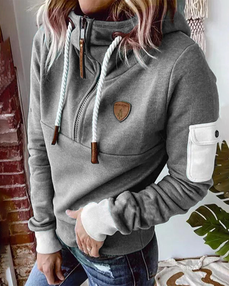 Warme, casual hoodie met halve rits, ideaal voor koude dagen met een modern en comfortabel ontwerp.