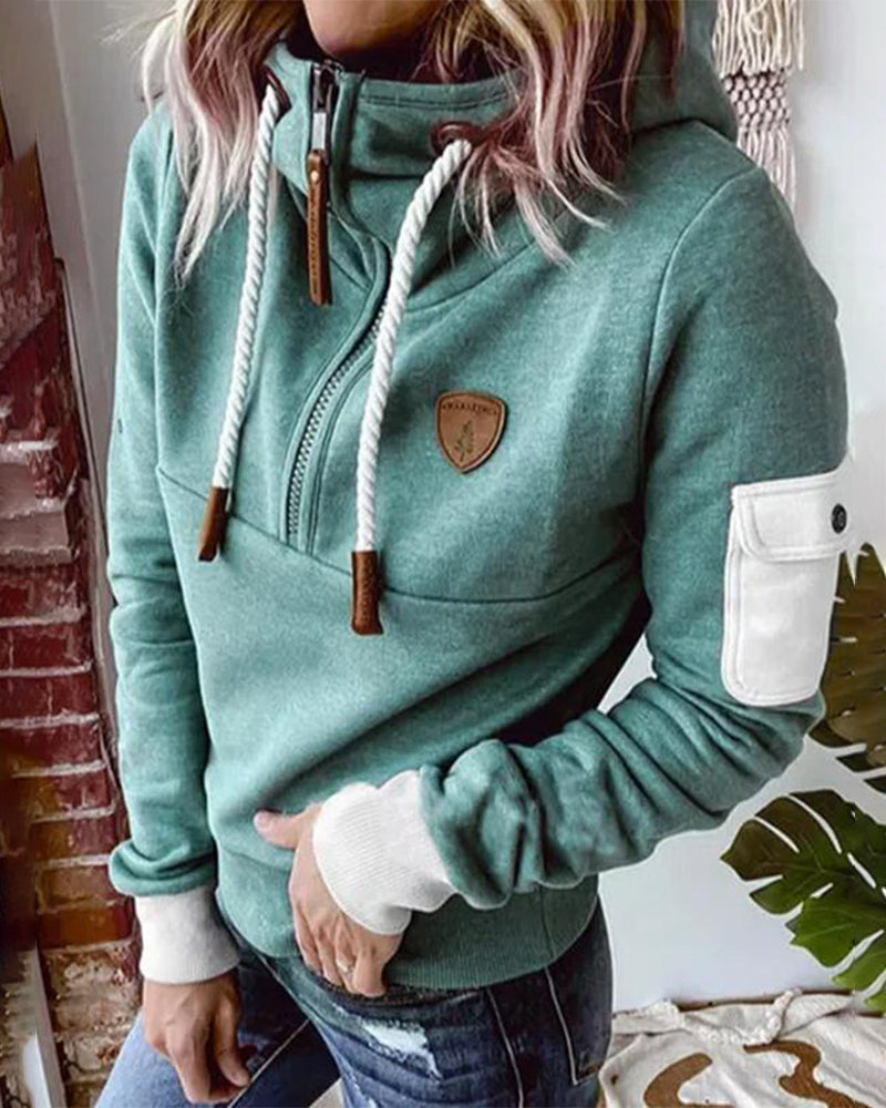 Warme, casual hoodie met halve rits, ideaal voor koude dagen met een modern en comfortabel ontwerp.