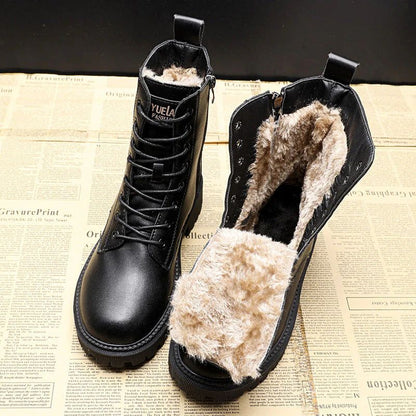 Leren winterlaarzen voor dames met ritssluiting aan de zijkant en warme voering, ideaal voor herfst- en winterdagen.