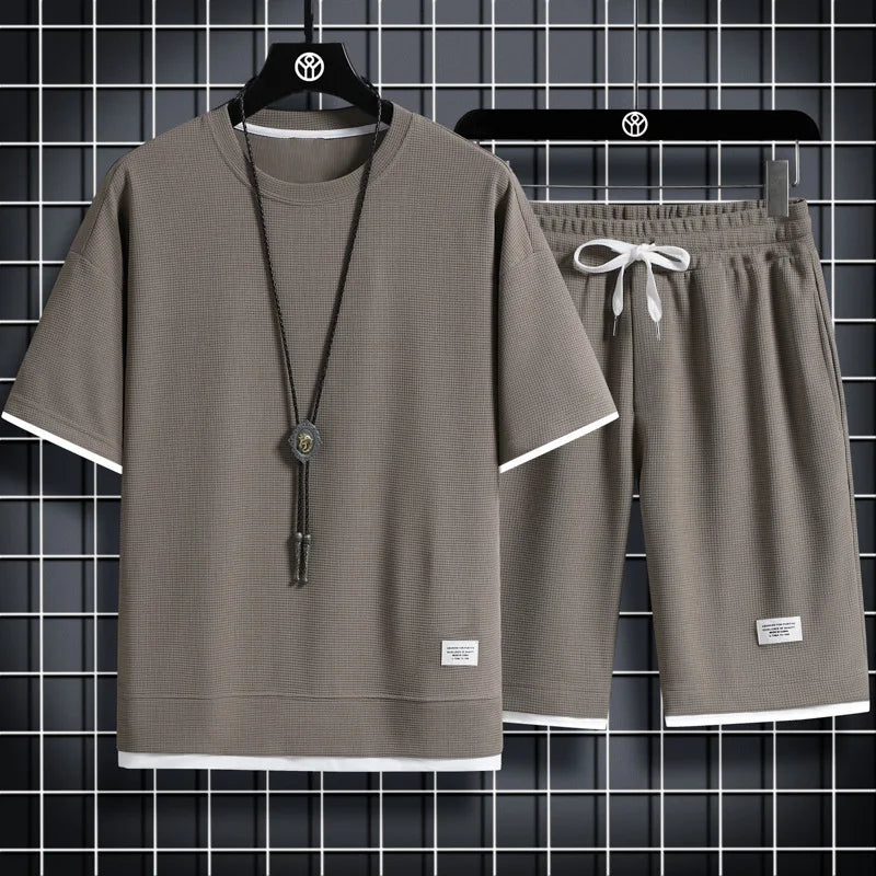 Zomerset voor mannen met shirt met korte mouwen en korte broek - stijlvol en comfortabel.